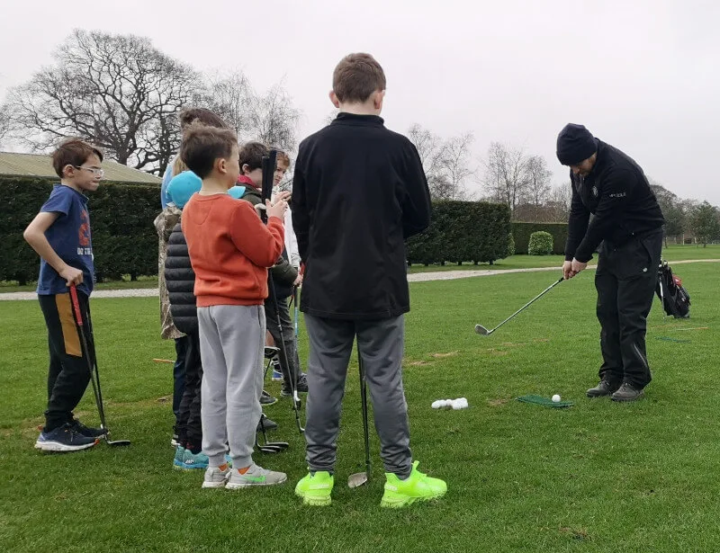 Joel Preston coaching beginners at Malton & Norton Golf Club